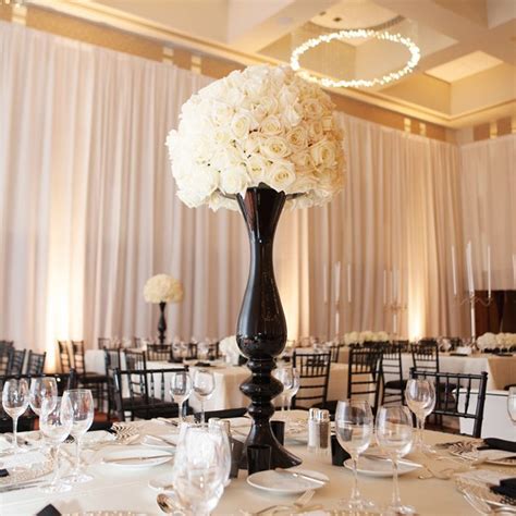 black tall vases centerpieces|More.